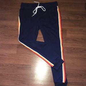 navy joggers with rainbow stripes